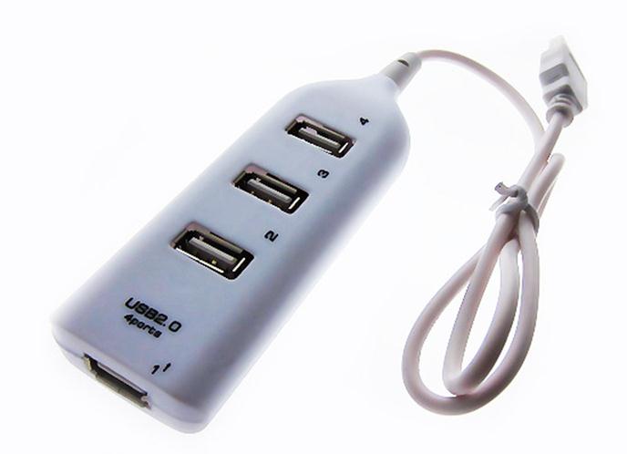 Το μικρο-USB συνδέεται με το gadget αφής, το USB προς τα αριστερά μέσω του προσαρμογέα είναι συνδεδεμένο στο δίκτυο και στα δεξιά υπάρχει μονάδα δίσκου flash